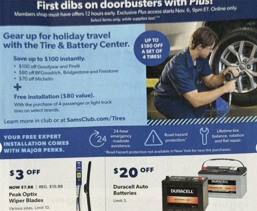 A poster with a man holding a tire