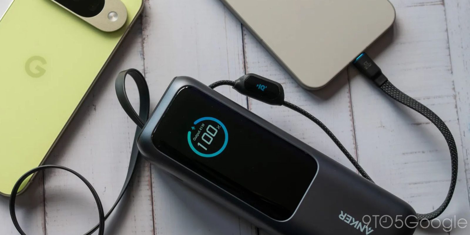 Image showing an Anker power bank charging two smartphones.