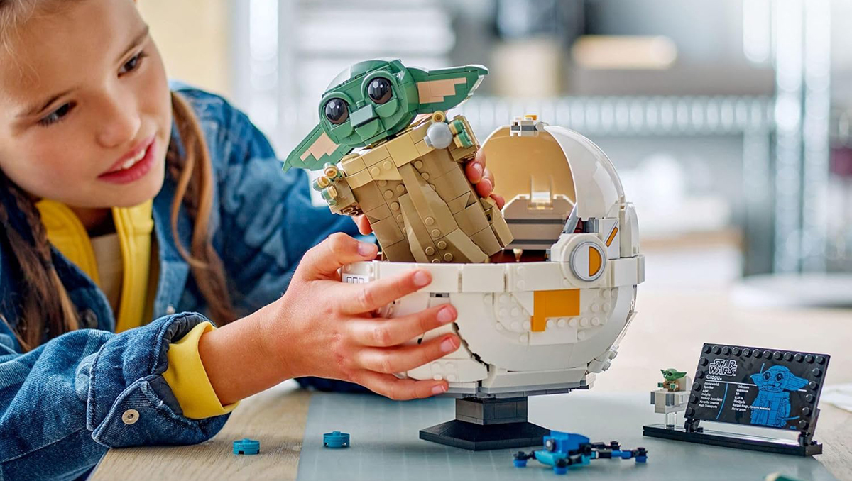 A child holding a toy