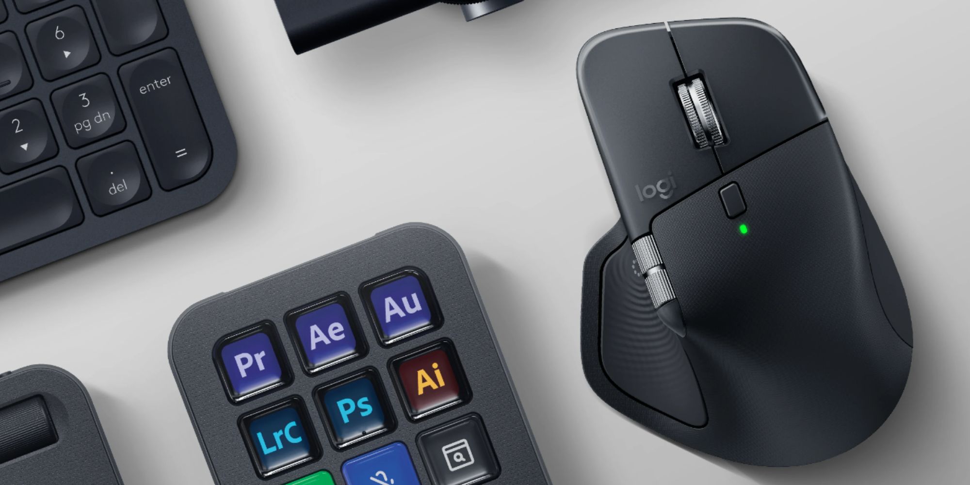 Image showing Logitech's MX Master 4 mouse next to other Logitech peripherals.