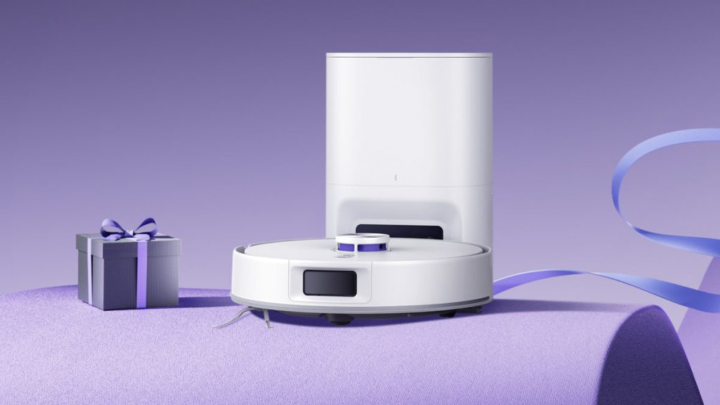 A robot vacuum cleaner on purple carpet