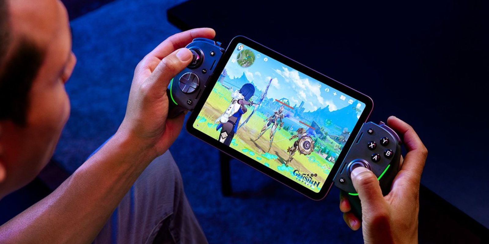 Image showing a person holding an iPad with Razer's Kishi Ultra controller attached to it.