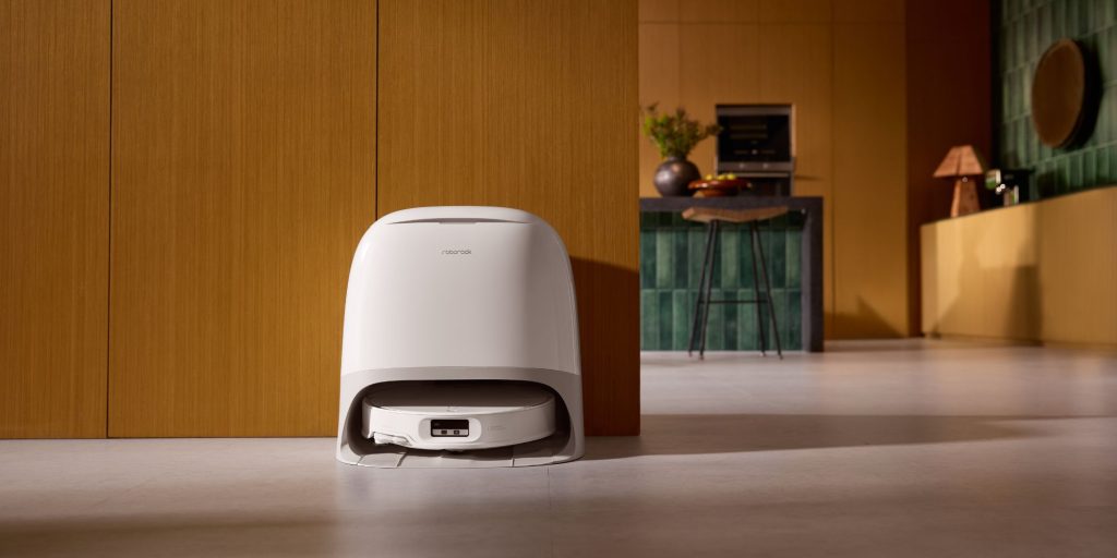 A white robot in a room