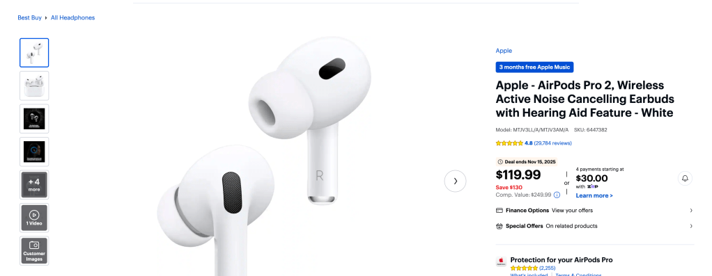 A close up of a pair of white earbuds