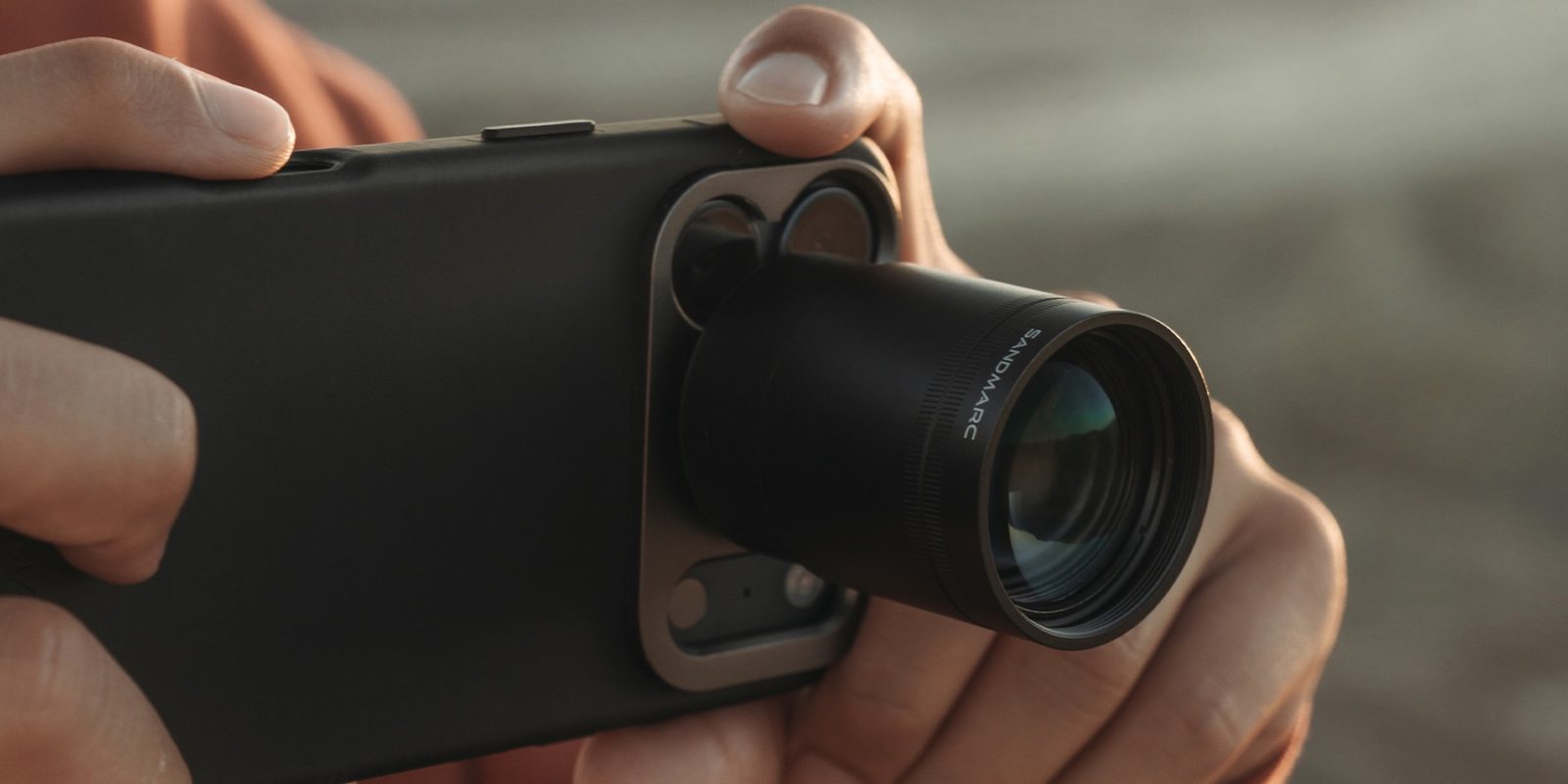 A person holding a camera