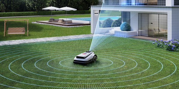 A robotic lawnmower in a yard