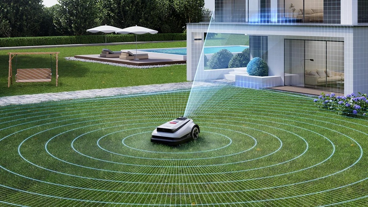 A robotic lawnmower in a yard