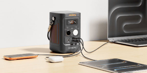 A black box with wires connected to a laptop