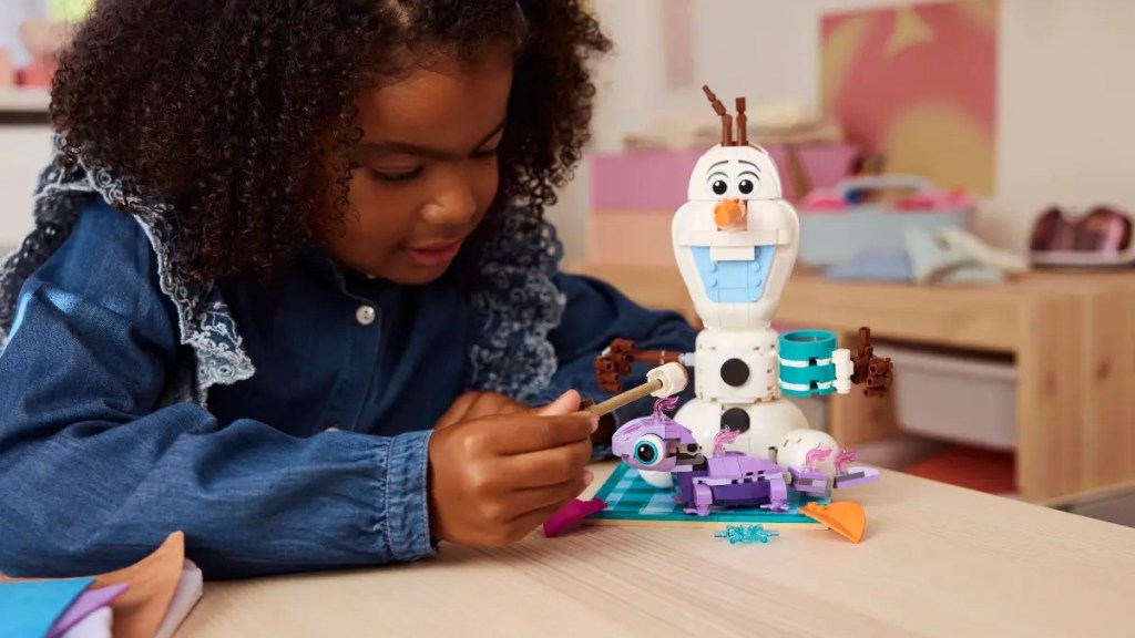 A girl playing with a toy