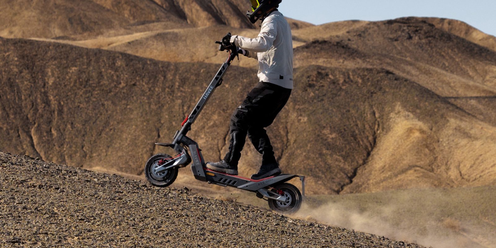 A person riding a scooter