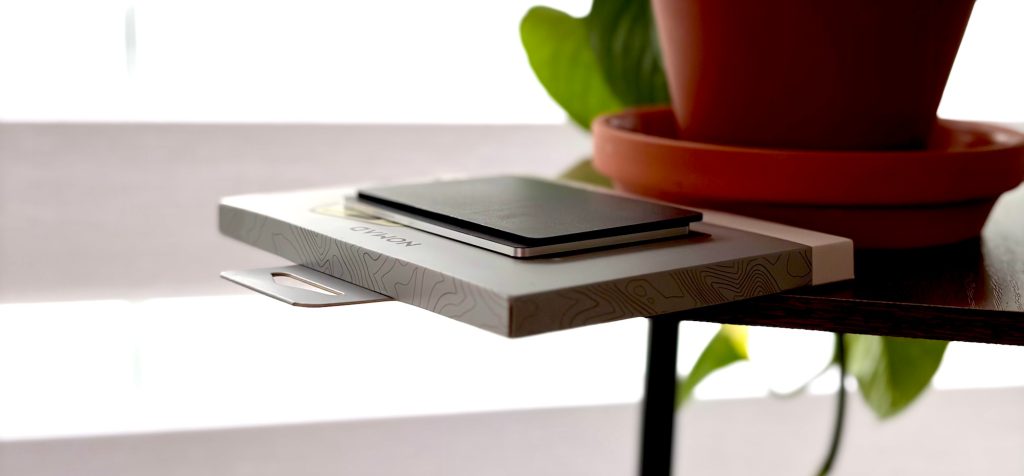 A black and silver device on a white surface