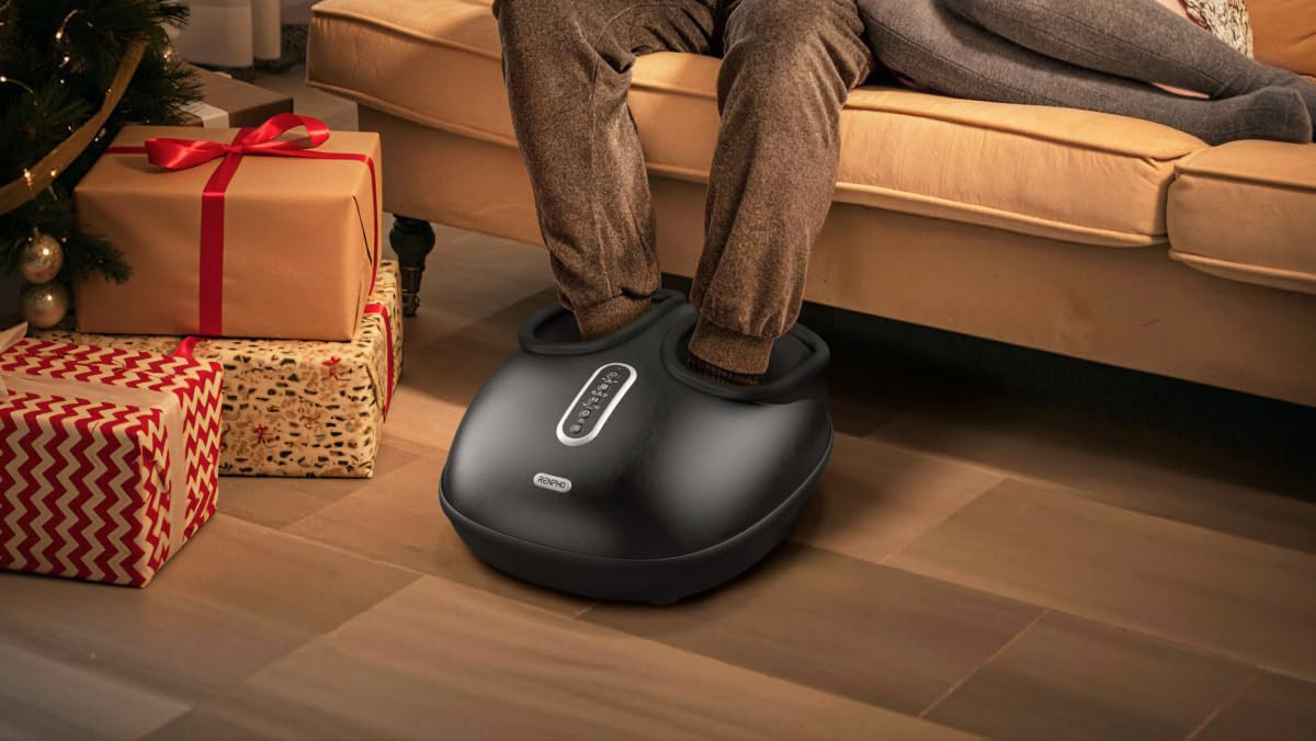 A person's feet in a foot massager