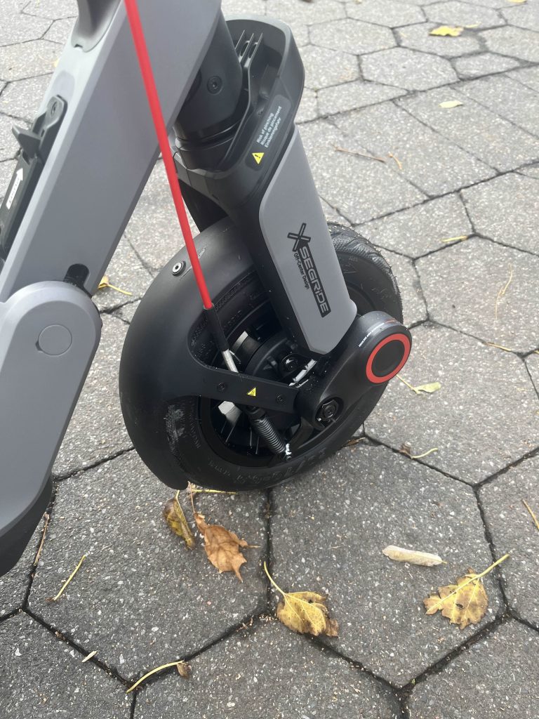 A wheel of a scooter