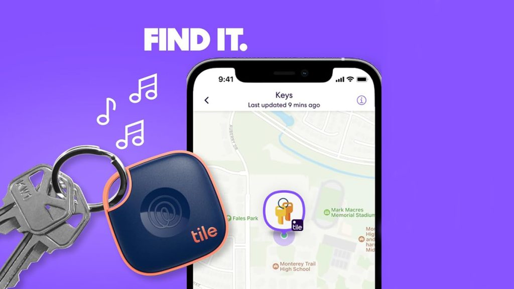 A phone with a keychain on it