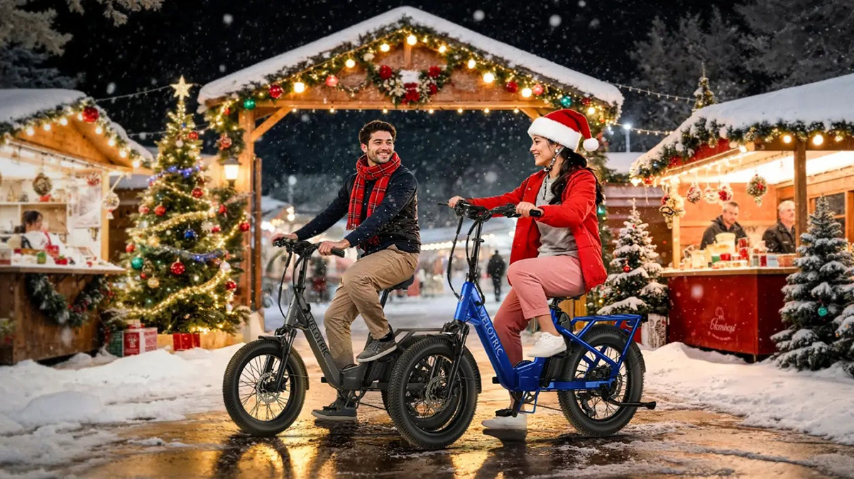 A man and woman riding bikes in the snow