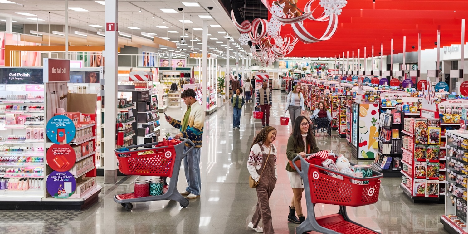 People in a store with shopping carts