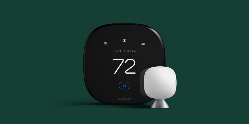 A black square device with a white square object on it