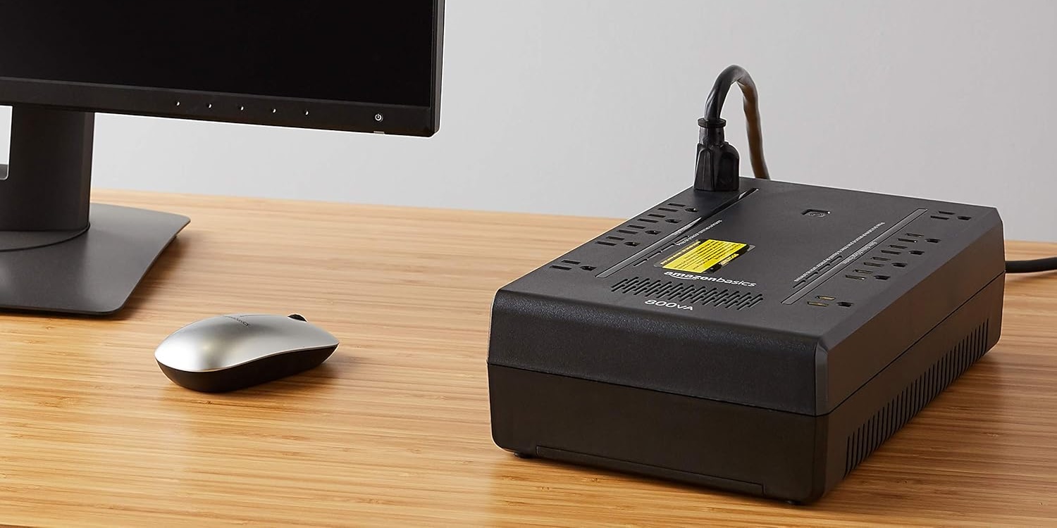 A computer monitor and a rectangular box