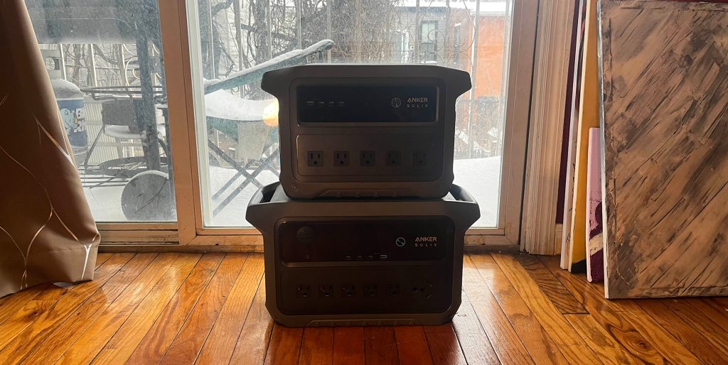 A stack of power outlets on a wood floor