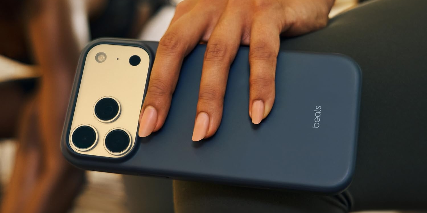 A hand on a cell phone