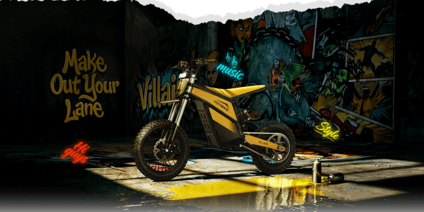 A motorcycle parked in a dirty room