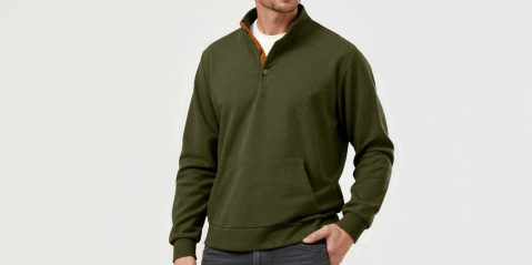 A man in a green sweater