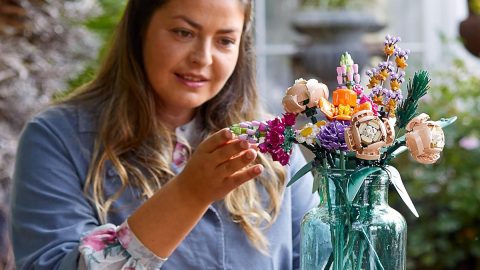A woman holding a bouquet of flowers