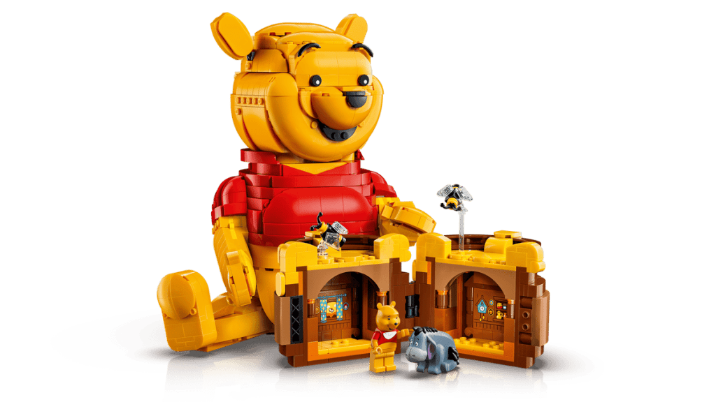 A toy bear with a building set