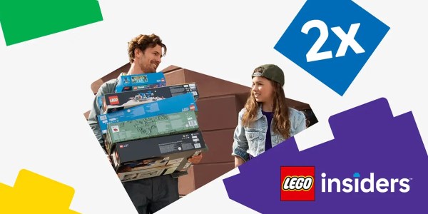 A man and girl holding boxes