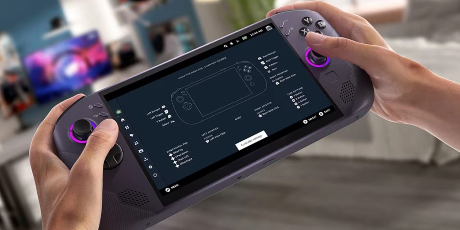 A hand holding a gaming device