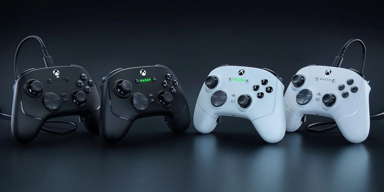 A group of black and white video game controllers.