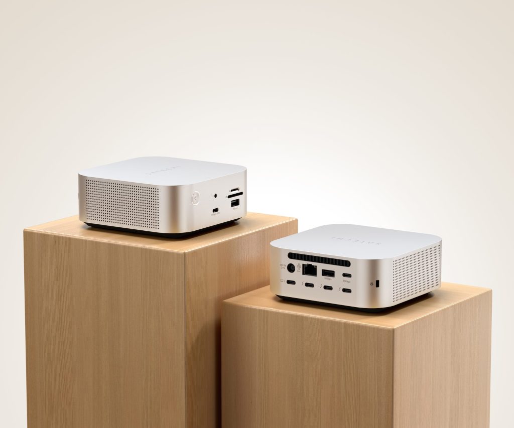 A pair of rectangular electronic devices on wooden cubes