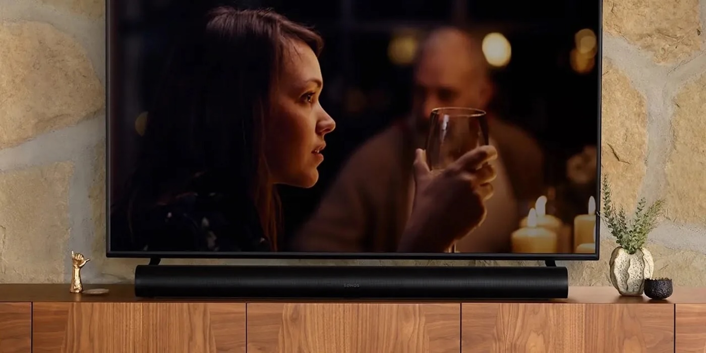 A woman looking at a wine glass