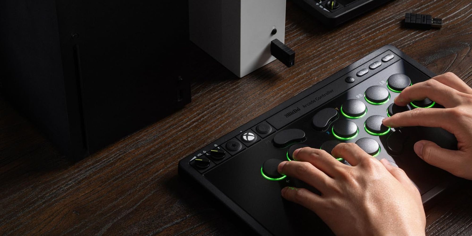 A hand on a controller