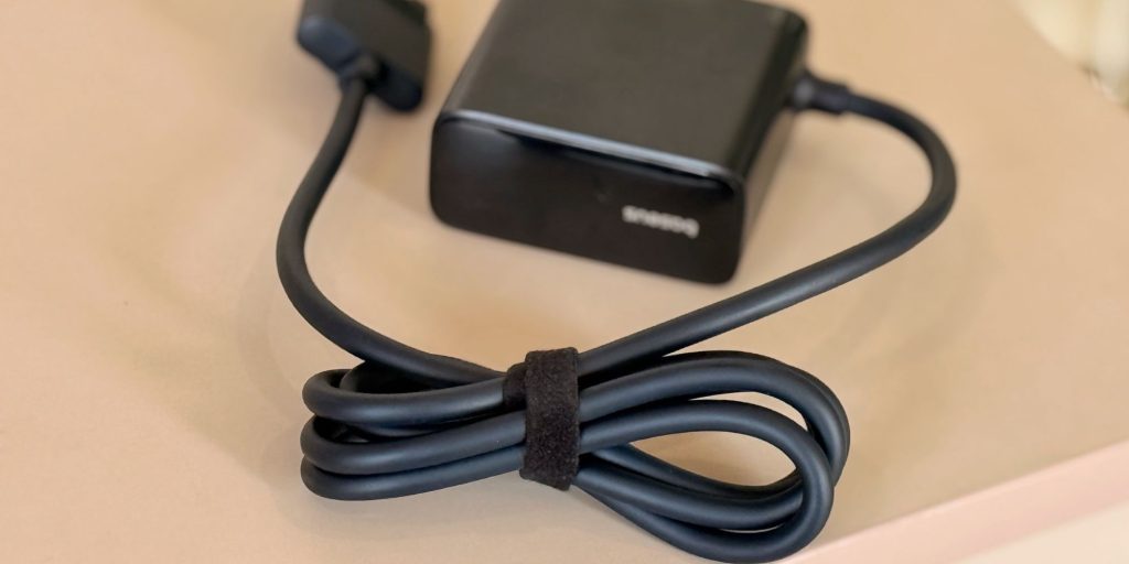 A black power cord and box